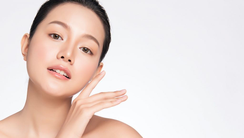 beautiful asian woman with fresh healthy skin